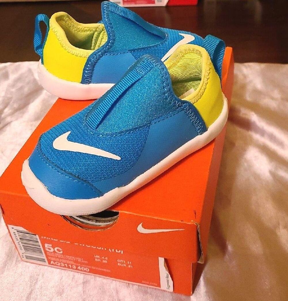 Nike Lil' Swoosh blue and yellow slip on toddler sneaker